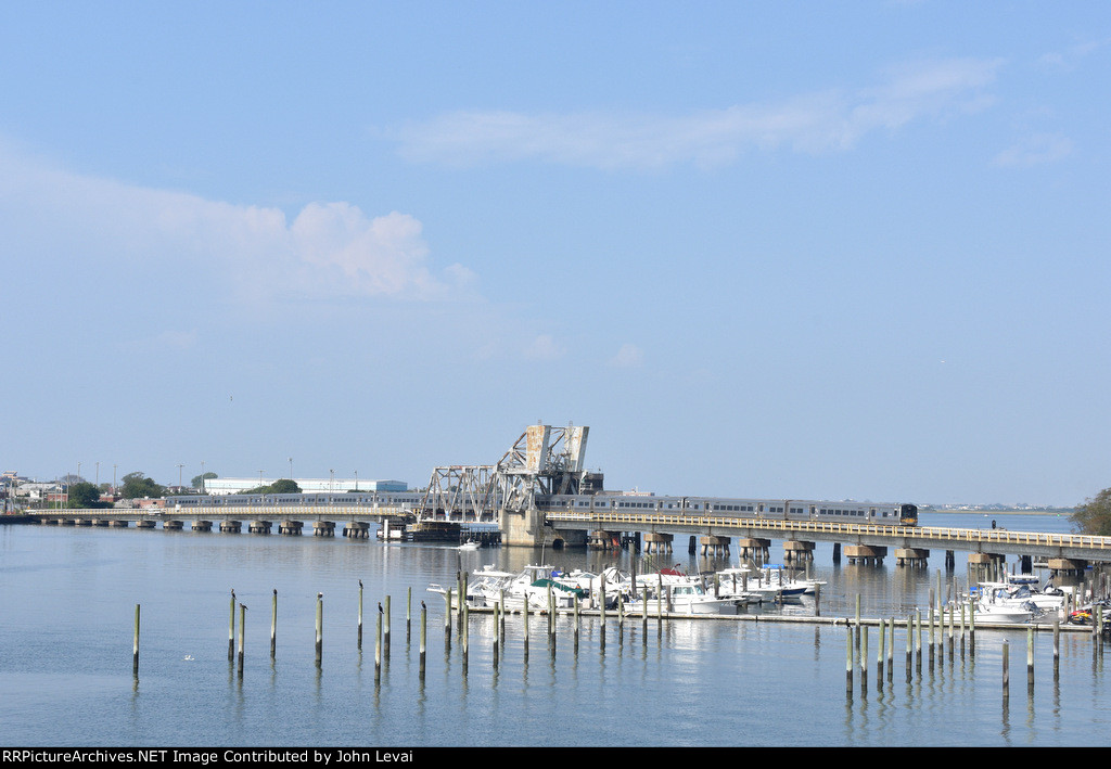 LIRR Train # 6817, with M7 Set, crossing Reynolds Channel Drawbridge-this is one of the few bascule style crossings on the LIRR system.